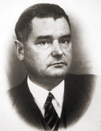 Henryk Sławik w marynarce, koszuli i krawacie, fotografia portretowa (popiersie)